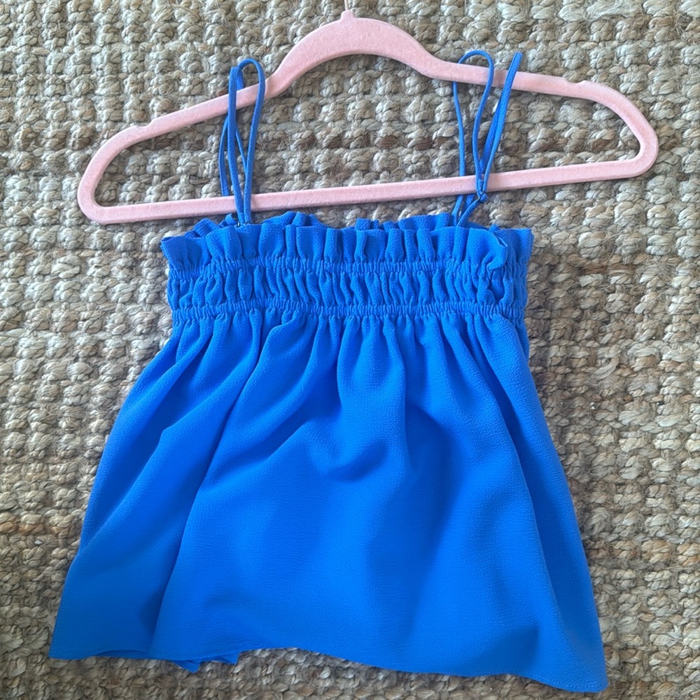 cute tank top, pretty blue color, size medium!